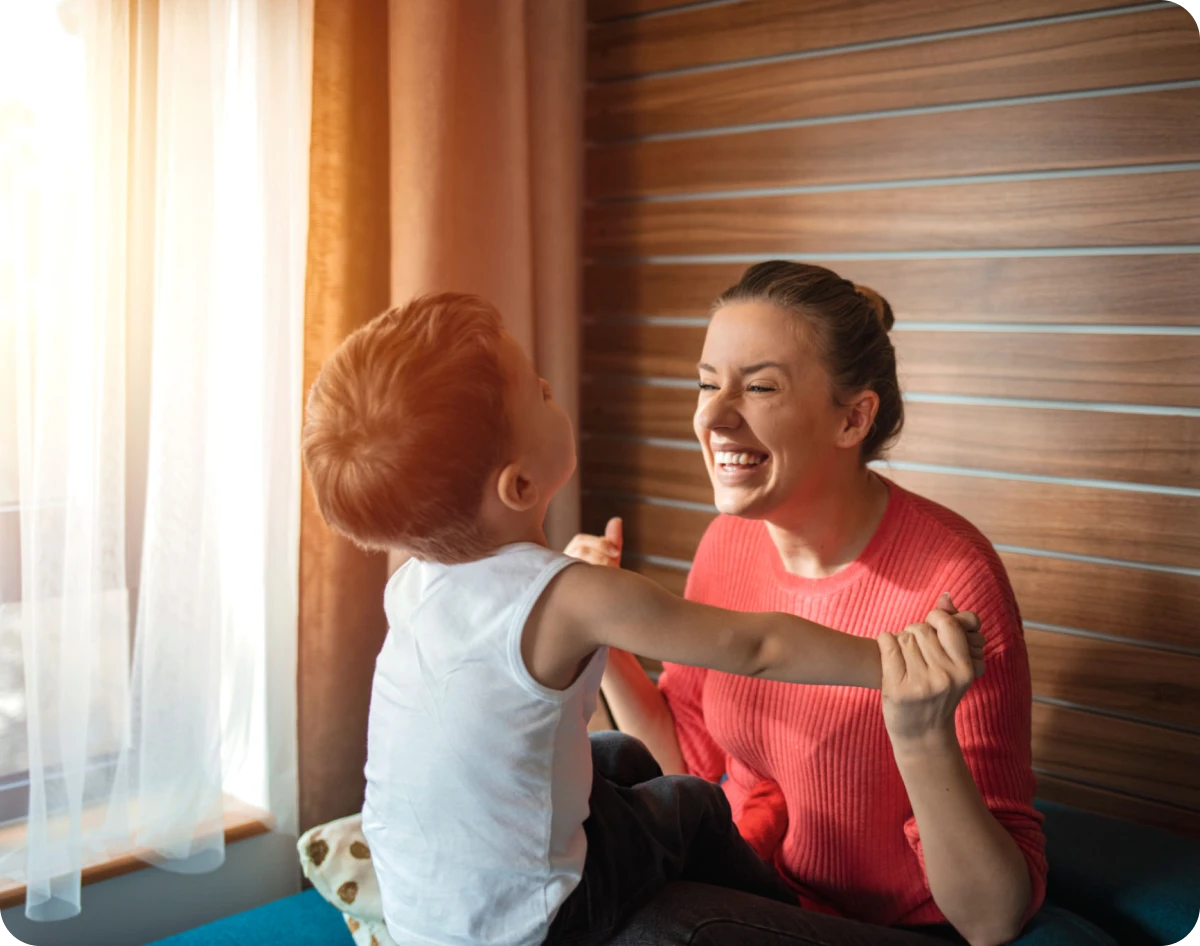 Joyful playtime by the window