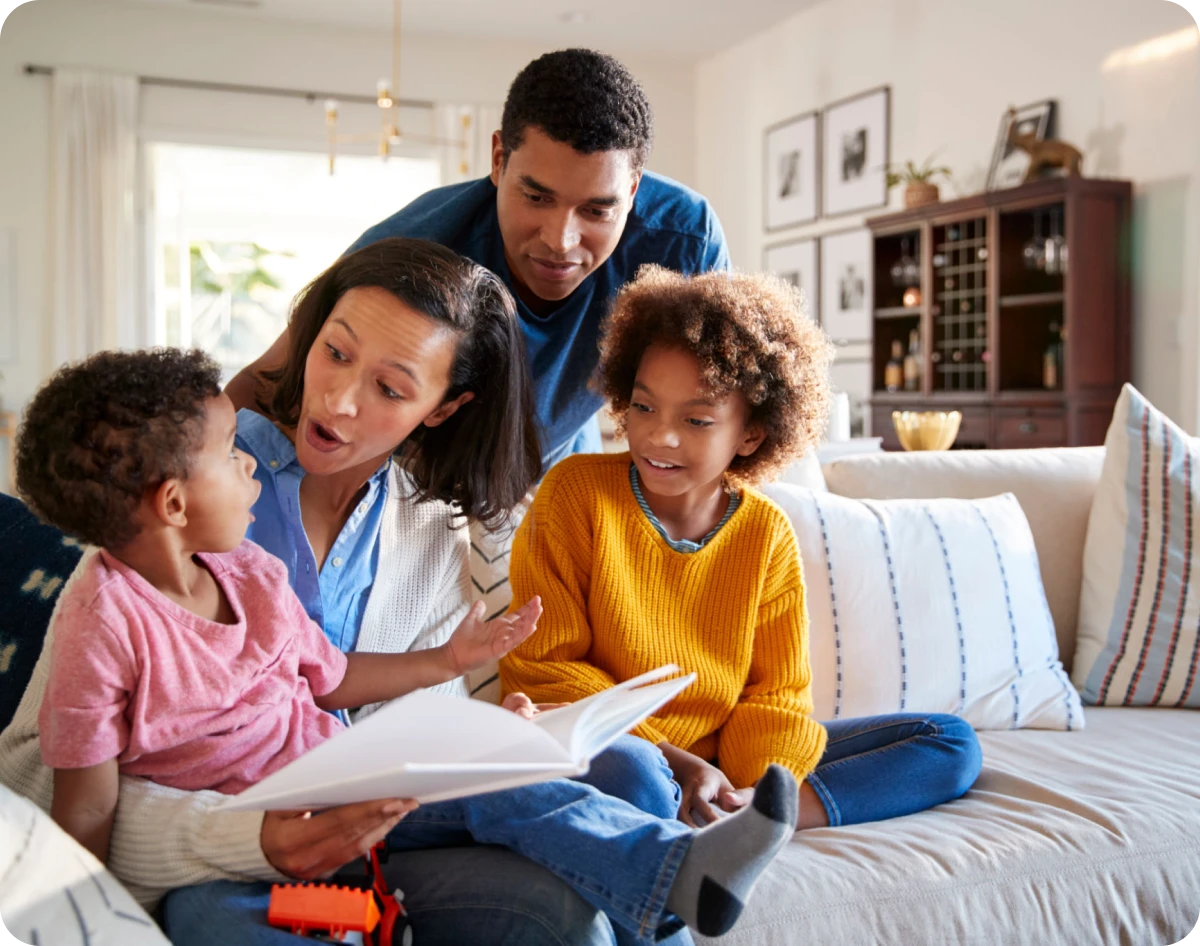 Parents and kids enjoying a book