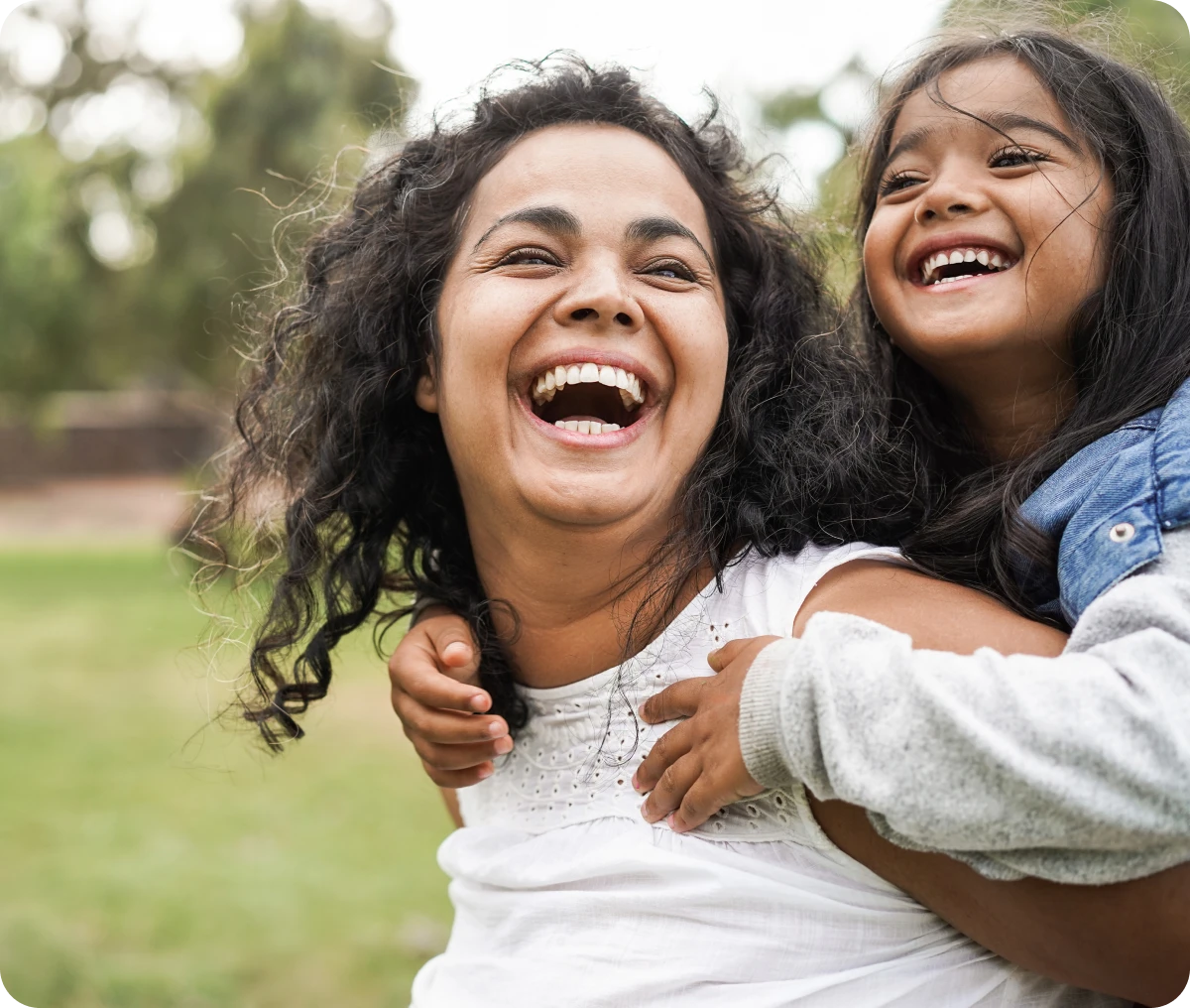 Joyful piggyback ride in the park